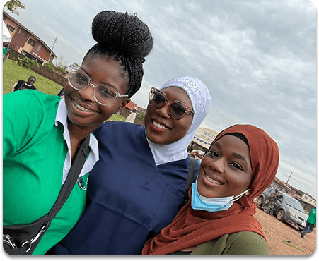 Healthcare professionals - Three women healthcare workers smiling together